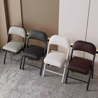 Chaise pliante noire de style boutique avec structure métallique pour fêtes et restaurants