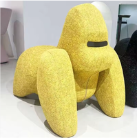 Fauteuil de salon moderne à roulettes en forme de gorille, fauteuil d'appoint sculptural, mobilier rembourré en tissu et métal pour appartement et salon