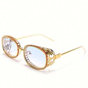 Lunettes de soleil ovales steampunk de luxe avec logo personnalisé, monture métallique creuse gravée, ornées de strass pour femme - Product Image 1