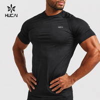 T-shirt de compression pour homme, léger, en nylon et élasthanne, coupe ajustée, pour entraînement et sport, fabriqué sur mesure par HUCAI OEM.
