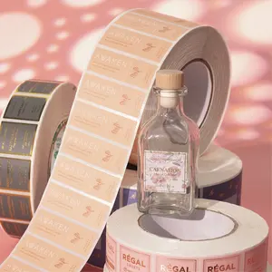 Rollo de etiquetas autoadhesivas impermeables, impresión personalizada de logotipos cosméticos, embalaje de botellas