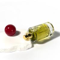 Vente en gros de flacons de parfum transparents ronds et cylindriques vides, atomiseur de parfum, emballage pour soins de la peau, flacon de parfum en verre 50 ml