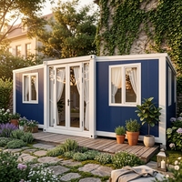 Maison conteneur modulaire en acier pliable à double aile, contemporaine et résistante aux intempéries, pour usage en bureau extérieur