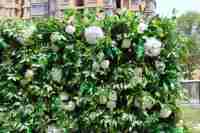 Taille personnalisée vert 3D mur floral en gros mur de fleurs panneau artificiel toile de fond décoration pour le mariage événement mur