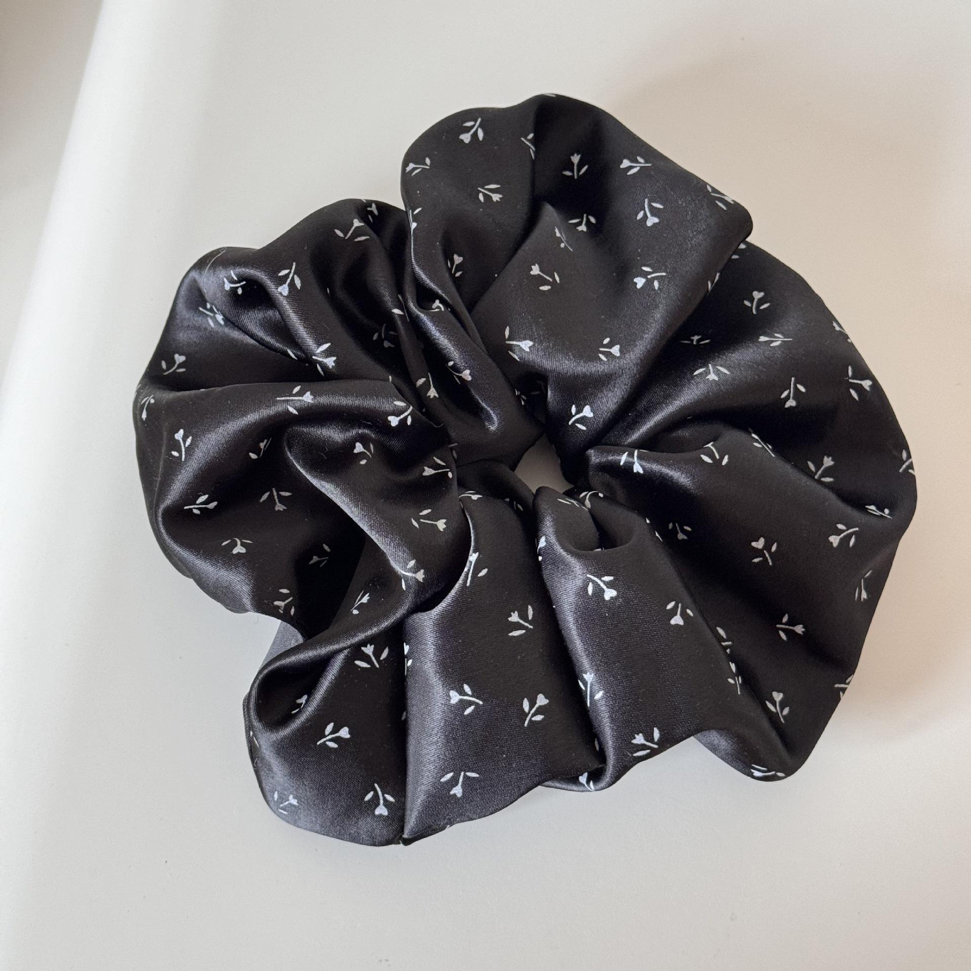 Bague à cheveux fleurie noire