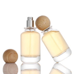 Bestselling 50ml glass perfume <b>bottle</b> refillable cosmetic <b>spray</b> <b>empty</b> <b>bottle</b> with step body and round ball cap for travel - Product Image 1