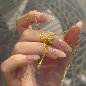 Nuova Collana 2026 Serie Principessa Fugitiva con Fiocco Dorato e Nappe, Diamanti, Catena Geometrica in Ottone Figaro da <span class=keywords><strong>Donna</strong></span>, Trendy per Anniversario - Product Image 2