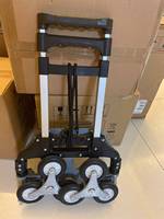 Chariot de courses pliable en alliage d'aluminium à quatre roues, deux-en-un, avec plateforme de rangement, capable de monter les escaliers, rétractable à un bouton, OEM