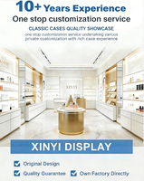 Meuble de présentation de parfums moderne à LED, écologique, en or recyclable, en acier inoxydable, comptoir de présentation de luxe pour showroom