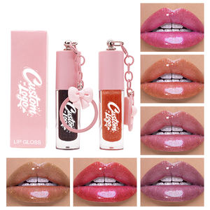 Vente en gros <span class=keywords><strong>de</strong></span> <span class=keywords><strong>gloss</strong></span> à lèvres hydratant végétalien, personnalisable avec logo, <span class=keywords><strong>gloss</strong></span> à lèvres avec porte-clés, <span class=keywords><strong>gloss</strong></span> à lèvres en marque privée avec porte-clés - Product Image 1