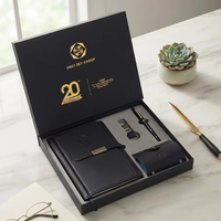Ensemble cadeau exécutif personnalisé avec logo, carnet en cuir noir de luxe, stylo, porte-clés, porte-cartes de visite