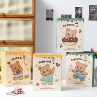 Sac cadeau en papier de texture ours beurre dessin animé haut niveau d'apparence emballage cadeau d'anniversaire sac en papier sac à main souvenir