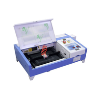 Mini machine de découpe laser 40W 50W 3020 CO2 Prix pour le bois bambou cuir acrylique