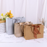 Sac cadeau de luxe pour les achats professionnels, sac en papier élégant personnalisé pour les vêtements, les cosmétiques, le café
