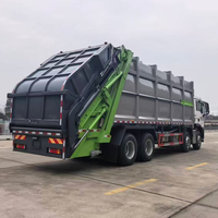 Vente directe usine SINOTRUK 8*4 26CBM Camion compacteur de déchets à chargement arrière