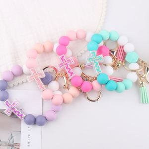 Nuevo Llavero de Silicona Colorido con Cuentas Cruzadas, Llavero con Borla Impresa con UV para Niños y Parejas, Regalos para Bolsos y Fiestas - Product Image 1