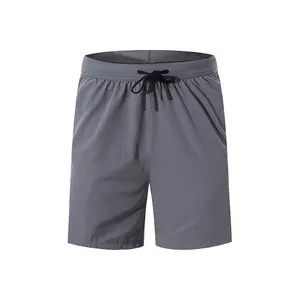 Ropa de entrenamiento de fabricante, pantalones cortos deportivos para hombre, pantalones cortos de gimnasio con cintura elástica y bolsillos con cremallera, ropa deportiva para fútbol