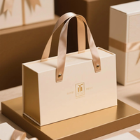 Boîte cadeau pliante en carton rose personnalisée avec poignée en cuir pour l'emballage de vernis à ongles et de crème pour le visage, boîtes rigides