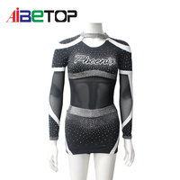 Uniforme de cheerleading de luxe noir et argenté avec strass |   Tenue de performance avec panneau en maille transparente et dos croisé