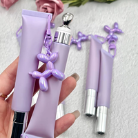 Huile à lèvres repulpante en tube souple à marque privée avec porte-clés, gloss à lèvres longue tenue changeant de couleur, huile à lèvres hydratante végétalienne