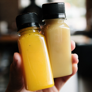 Empty 60ml PET Plastic Ginger Shot <strong>Mini</strong> 2oz Wellness Shots <strong>Bottle</strong> for Juice Soda <strong>Champagne</strong> Beverage Packaging Logo Printing - Product Image 1