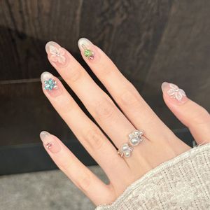 เล็บ<span class=keywords><strong>ปลอม</strong></span>แบบกดติด ทำมือ ลายตาแมว<span class=keywords><strong>ส</strong></span>ีนู้ดอ่อน  แบบสั้น เงางาม <span class=keywords><strong>ส</strong></span>ีชมพูนม ประดับหัวใจสีเขียว ดาวสีน้ำเงิน และอัญมณีสีแดงเม็ดเล็ก - Product Image 2
