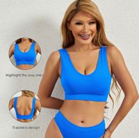 Soutien-gorge de sport sans couture côtelé à dos bas pour femme, rembourré, dos nageur, maintien moyen, en Spandex/Nylon, pour Yoga et Fitness, personnalisable en gros, OEM