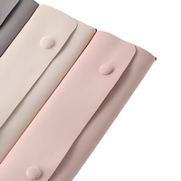 Pochette à bijoux portable en microfibre, rouleau à bijoux en velours avec bouton-pression, sac de rangement pour colliers, boucles d'oreilles et bagues, idéal pour les voyages