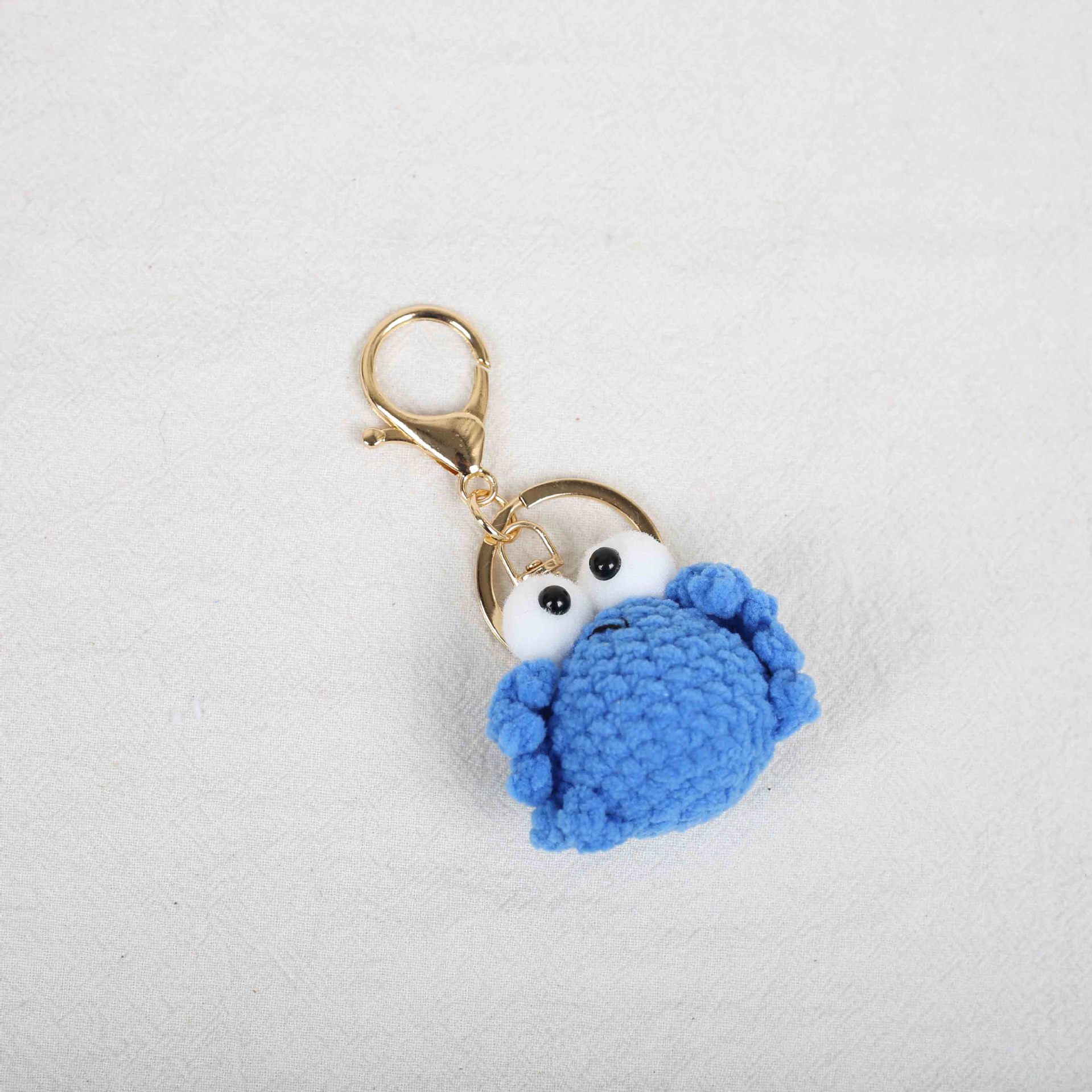 Hebilla oro cangrejo azul real