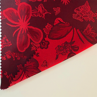 Le dernier tissu tissé floral de papillon rouge de tissu de jacquard de satin peut être employé pour la robe/robe somalienne de Dirac