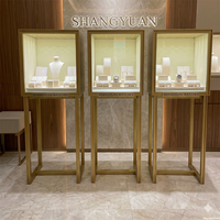 Vitrines de Luxe en Métal et Verre pour Bijoux, Présentoir Minimaliste Doré en Forme de Tour, Élégant Comptoir en Verre pour Montres, Idéal pour Showroom Commercial