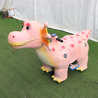 Trottinette électrique dinosaure personnalisée pour enfants, modèle avec siège sécurisé, idéale pour la location en aire de jeux intérieure/extérieure
