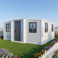 Maison conteneur extensible préfabriquée avec structure métallique blanche, clôture à piquets, pour jardin, maison de jardin, cabane de jardin, vente en gros, fournisseur d'usine