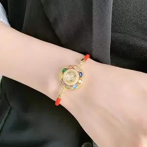 Malaisie quand tourner le bracelet bracelet coloré moulin à vent rotatif réglable corde rouge bracelet fait main