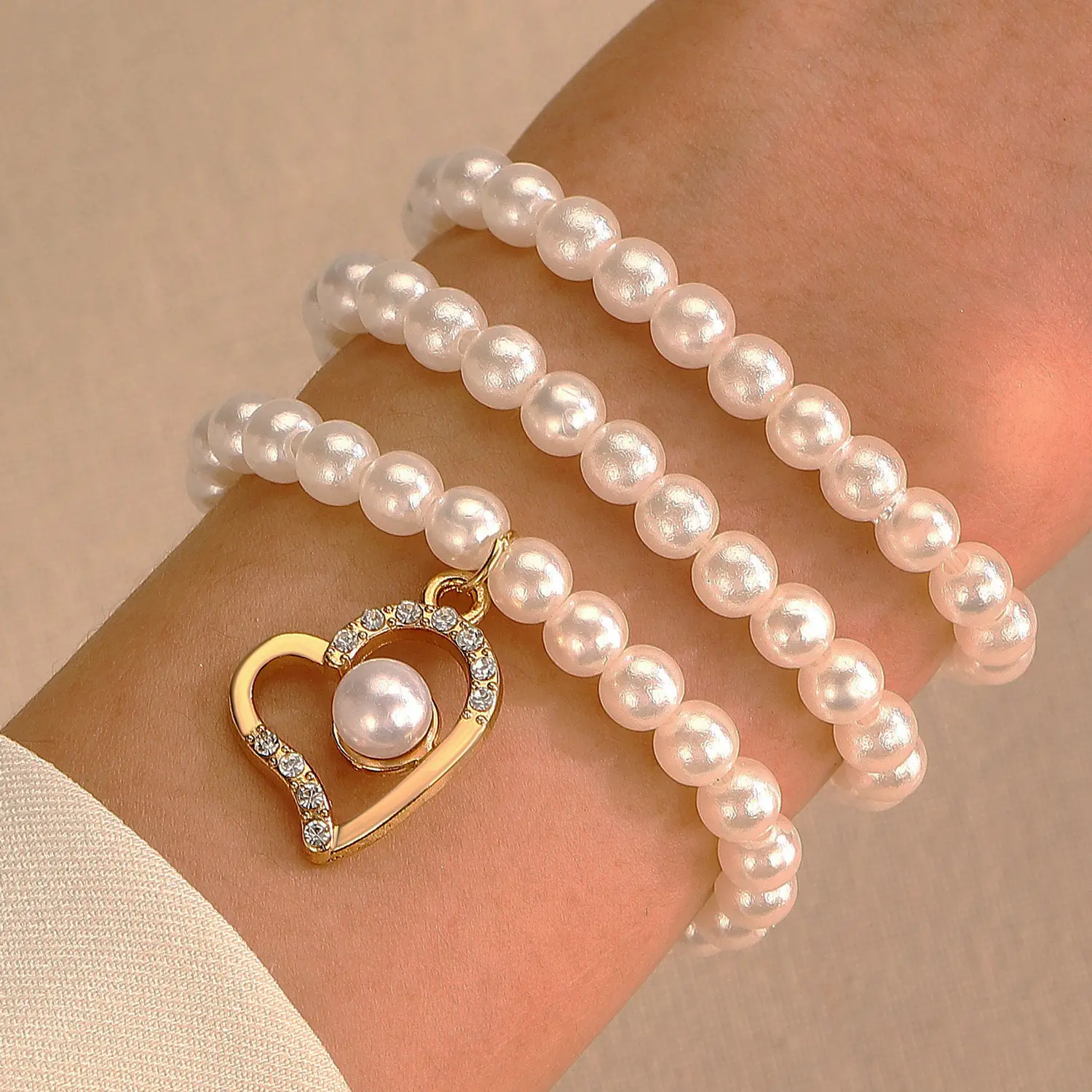 Conjunto de pulsera de perlas multicapa para mujer, pulsera colgante de corazón de diamantes de imitación de diseño de lujo ligero coreano para mujer