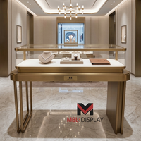 Vitrine de présentation sur mesure pour bijoux, en verre, avec comptoir en métal brossé, autoportante, éclairée par LED, pour montres, pour magasin de détail
