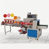 Petite machine d'emballage automatique de type coussin pour bonbons gélifiés, bonbons glacés, bonbons en bâtonnets, pain et savon