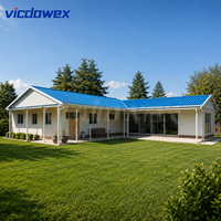 VICDOWEX Maison préfabriquée contemporaine en structure acier de type T, avec isolation thermique et caractéristiques ignifuges, pour personnel de luxe
