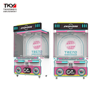 Machine à griffes double poste avec grand espace de rangement, design adapté aux enfants pour la distribution interactive de jouets mystères