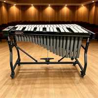 Instrument de percussion orchestrale professionnel avec barres sonores métalliques accordées, tubes résonateurs, support mobile, vibraphone