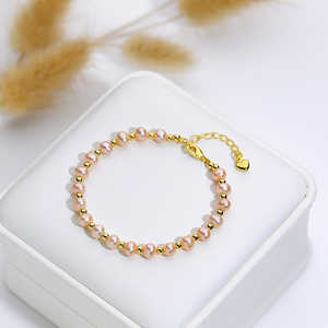 Bracelet haut de gamme avec boucle OT, papillon frangé, trèfle à quatre feuilles, perle d'eau douce naturelle, bijoux en gros - Product Image 1