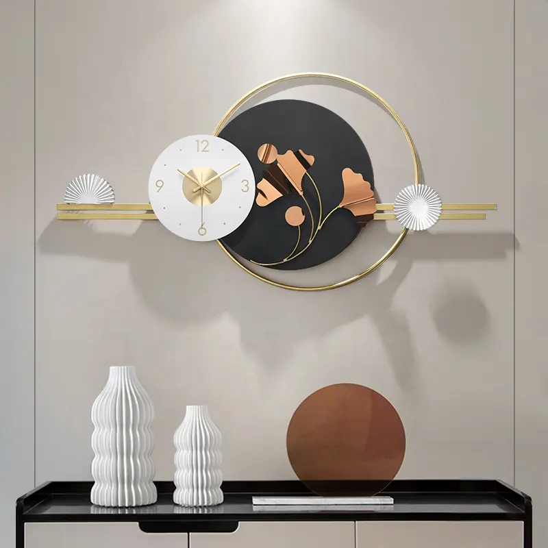 सुरुचिपूर्ण रचनात्मक घड़ी गृह सजावट Minimalist आधुनिक धातु Gingko पत्ती के आकार का कला दीवार घड़ियां