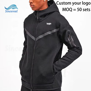 Ensemble <span class=keywords><strong>de</strong></span> survêtement pour homme en molleton technique polyester avec logo personnalisé, comprenant un sweat à capuche zippé et un pantalon <span class=keywords><strong>de</strong></span> jogging - Product Image 1