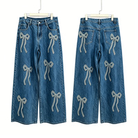 Pantalons en jean pour femmes Huanqiu, jean rétro avec motif de nœud en cristal scintillant, jean élégant de haute qualité pour femmes, fabricant