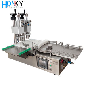 Máquina taponadora automática de botellas de viales de escritorio 3600 BPH 0.6Mpa para aplicaciones químicas médicas de aceite-Caja de barril de PLC eléctrico - Product Image 1
