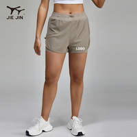 Vente en gros de shorts de gymnastique JIEJIN pour femmes 2 en 1 double pour la course à pied et le fitness avec compression