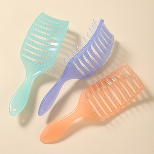 Mini cepillo de pelo de masaje en forma de huevo con logotipo personalizado, peine de peluquería portátil resistente al calor para desenredar en húmedo para mujeres - Product Image 1
