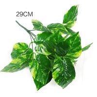 Décoration de la maison feuille en plastique plantes artificielles suspendues haies vertes clôture perforeuse décoration de la pièce feuilles