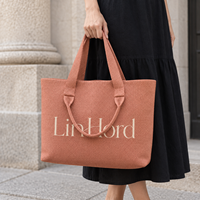 Sac à bandoulière tricoté avec logo personnalisé et poignées longues et courtes pour les détaillants de boutiques proposant des accessoires de mode quotidiens