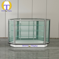 Vitrine d'exposition moderne pour magasin de détail avec éclairage LED, design écologique, base blanche, cadre en aluminium noir, vision panoramique